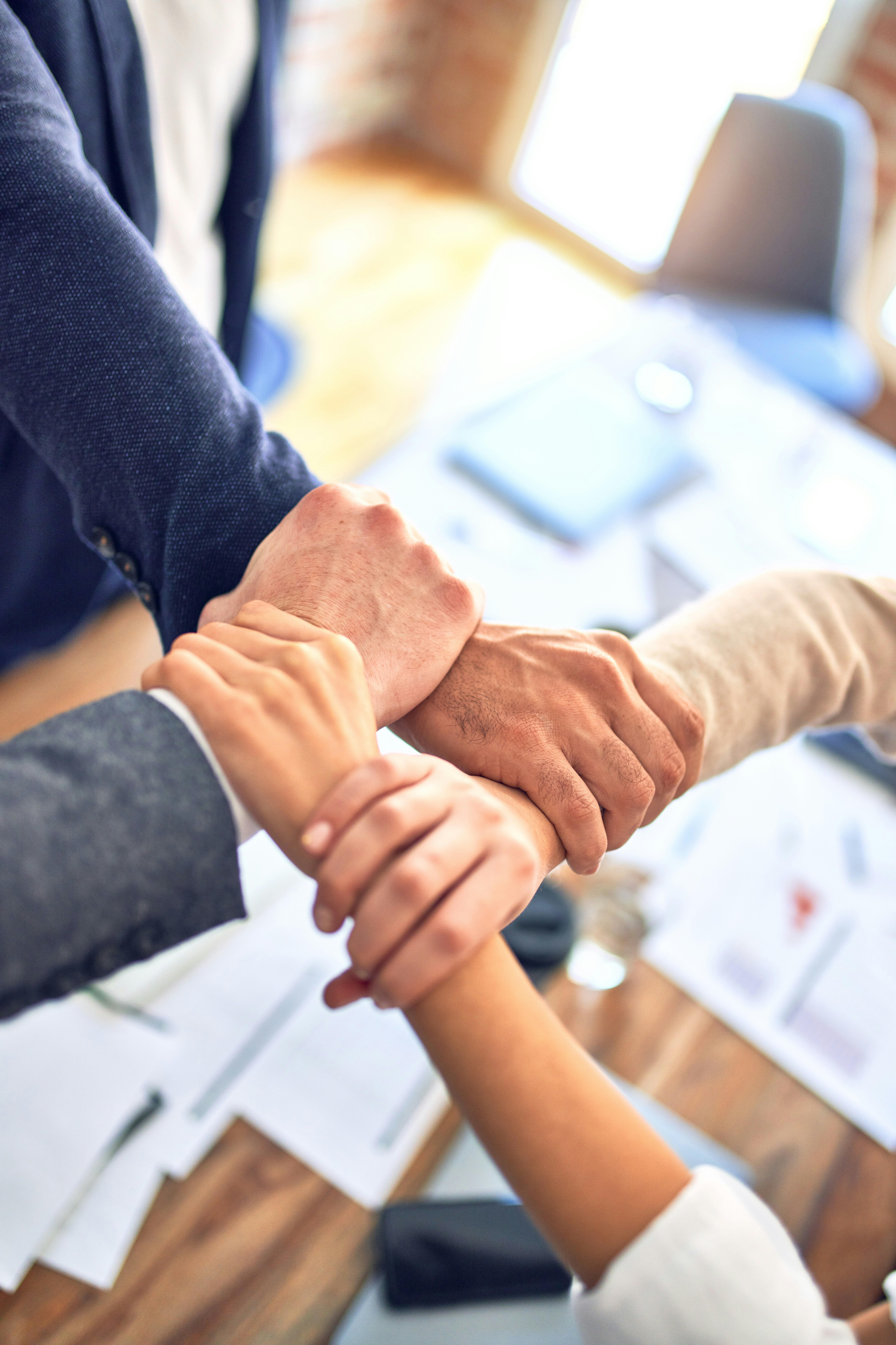Business professionals shaking hands in partnership
